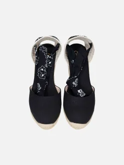 Espadrillas nere in tela stampata con zeppa alta e laccio alla caviglia